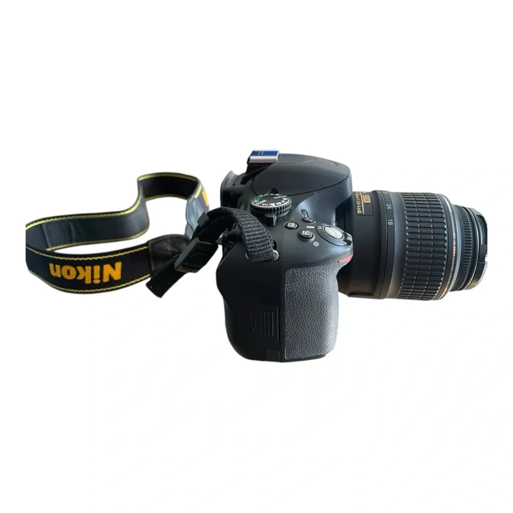 Nikon D5100 DSLR Camera Bundle with 18–55mm and 55–300mm Lenses + Accessories